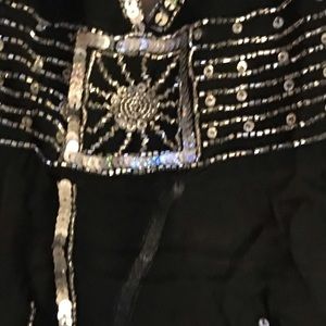 Sequined sheer black rayon halter top.